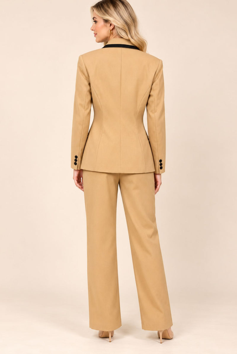Back view of camel blazer and trouser suit set showing blazer shaping seams and cuff buttons