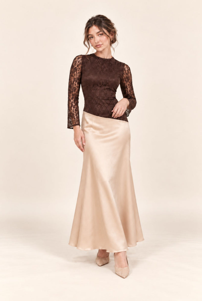 Petite brown and champagne maxi dress showing the asymmetric waistline and flowing satin skirt