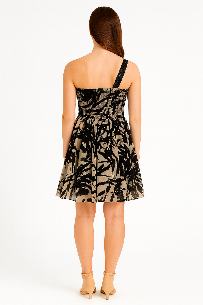 Back view of black beige chiffon one shoulder mini dress showcasing elegant drape and fit