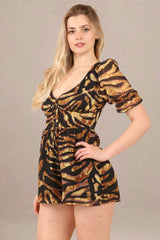 Close-up of v-neck relaxed fit cotton short sleeve romper animal print