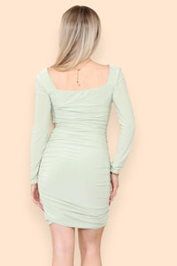 Back view of stretch fit square neck ruched bodycon party style mini dress