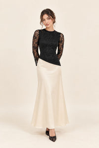 Petite black and cream maxi dress with an asymmetric waistline and flowing satin skirt