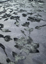 Detailed view of floral velvet burnout fabric texture on bodycon maxi dress