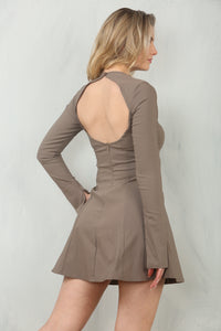 back view  of fitted long sleeve A-line style mini dress