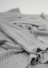 Fabric detail of high-waisted cardigan and skirt co-ord lounge set