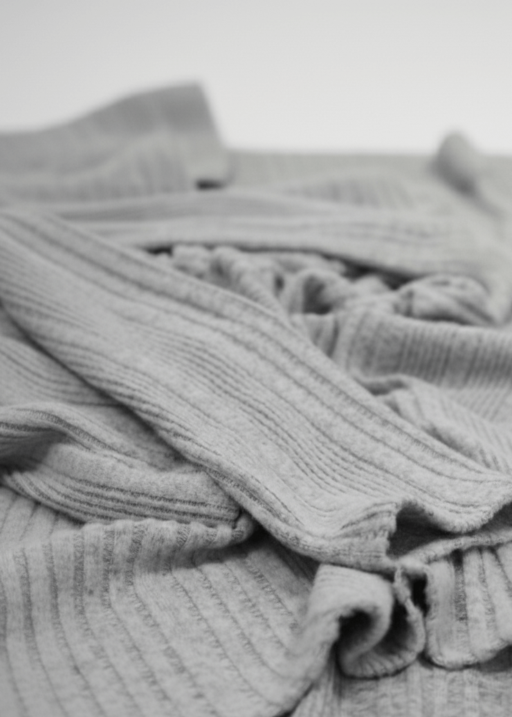 Fabric detail of high-waisted cardigan and skirt co-ord lounge set
