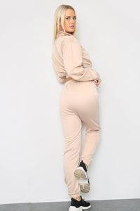 Back view of long sleeve zipper crop top with oversized matching joggers