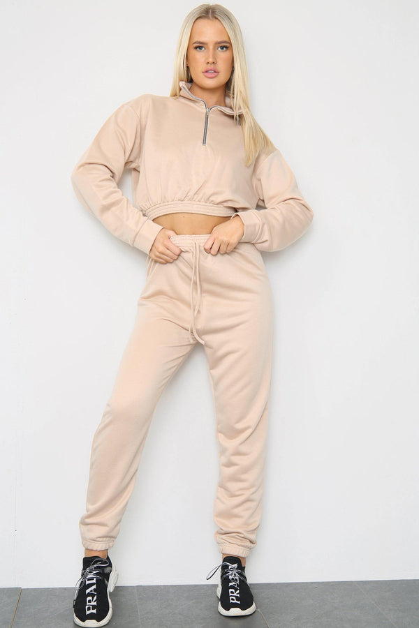 Front view of long sleeve zipper crop top with oversized matching joggers