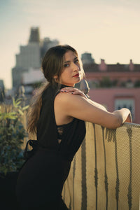 Side look view of scuba high neck tie waist wide leg jumpsuit