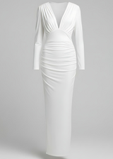 White evening gown with long sleeves on a light gray background