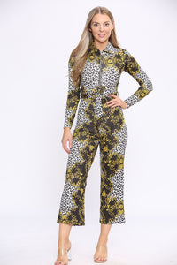 Closeup of wide leg fit statement chain print long sleeve jumpsuit, front detail